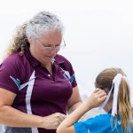 coaching our athletes - tracey tuia with junior athlete